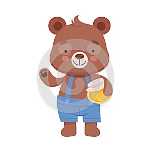 Smiling Bear Character Wearing Playsuit Holding Honey Jar in His Paws Vector Illustration photo