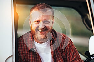 Smiling bearded driver