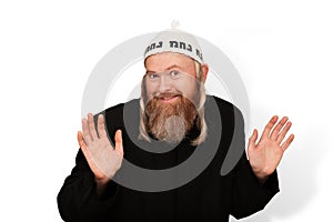 Smiling bearded Orthodox jewish man isolated on white background. Cheerful Jew with sidelocks in white yarmulke