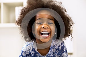 Smiling beautiful african girl with healthy teeth