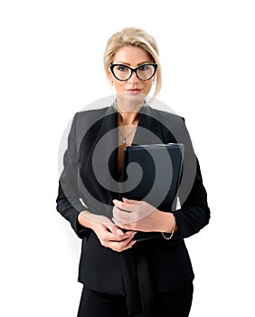 Smiling beautiful business woman with glasses. A confident business professional in an elegant black suit. Portrait isolated on