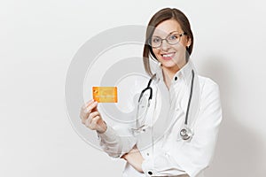 Smiling beautiful doctor woman with stethoscope isolated on white background. Female doctor in medical gown showing