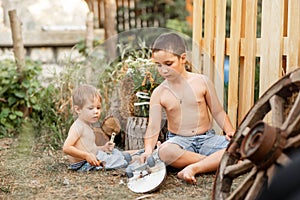 Smiling beautiful family on the backyard lawn. Childs expression