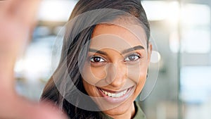 Smiling, beautiful and fresh female face winking feeling fun, silly and playful. Portrait of a happy woman head with