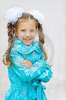 Smiling beautiful girl with bows