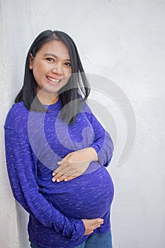 Smiling beautiful pregnant woman