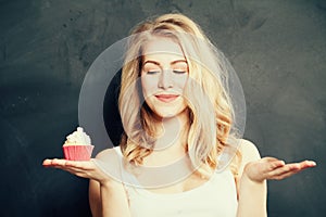 Smiling Beautiful Woman with empty and Unhealthy Food.