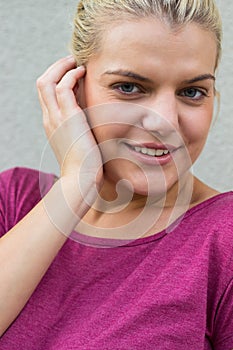 Smiling and beautiful woman over Wall - Building Feature