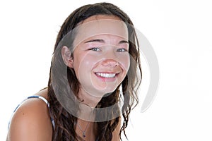 Smiling beautiful young teenage girl standing feeling confident isolated in white background Looks successful