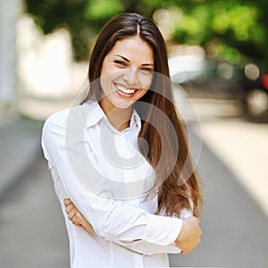 Smiling beautiful young woman outdoor