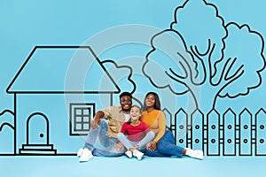 Smiling Black Family Sitting Together Against Illustrated Background of House