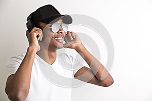 Smiling black guy with headphones