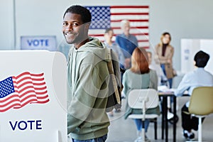 Smiling Black Man Voting