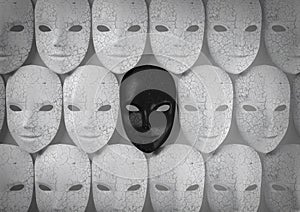 Smiling black mask among white masks, Hypocritical concept