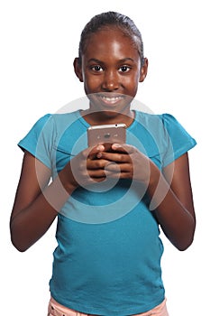Smiling black school girl holding her mobile phone