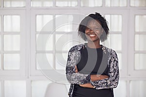 Smiling black woman with confidence pose
