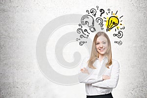 Smiling blond woman and questions marks light bulb