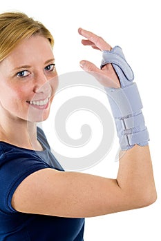 Smiling Blond Woman Wearing Supportive Wrist Brace