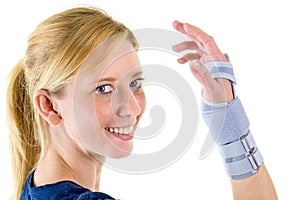 Smiling Blond Woman Wearing Supportive Wrist Brace