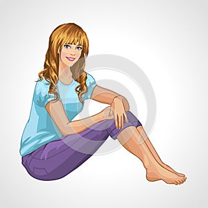 Smiling blonde girl sitting on the floor