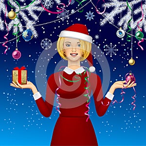 Smiling blonde woman in a Christmas hat with a gift on a blue background with white spruce branch and Christmas decorations