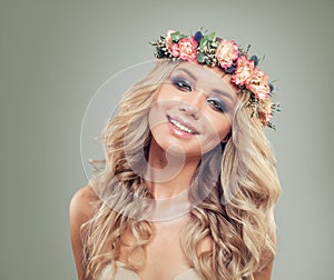 Smiling Blonde Woman Fashion Model in Rose Flowers