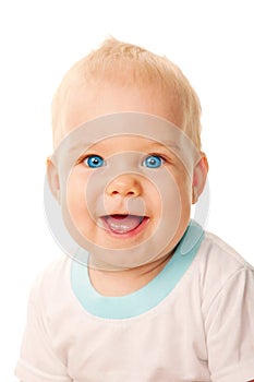Smiling blue-eyed baby face close-up.