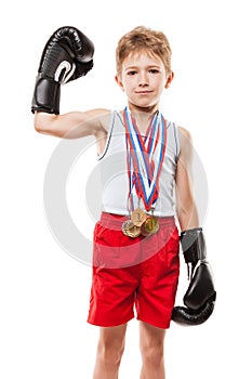 Smiling boxing champion child boy gesturing for victory triumph