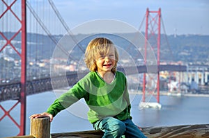 Smiling boy at the bridge