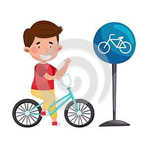 Smiling Boy Cycling Near Bicycle Road Sign Vector Illustration