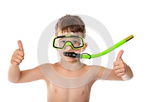 Smiling boy in diving mask with thumb up sign