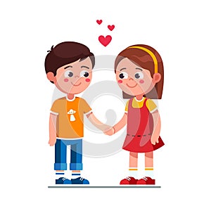Smiling boy and girl kids holding hands