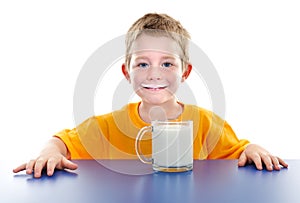 Smiling boy with milk mustache