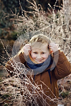Smiling boy outdoors portrait