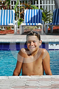 Smiling boy in the pool