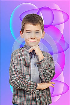 Smiling boy posing with hand to chin