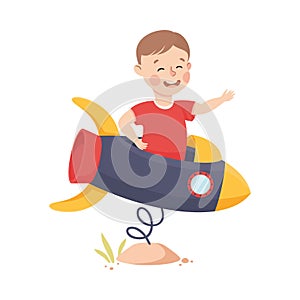 Smiling Boy Riding Rocket Carrousel Playing and Having Fun Vector Illustration