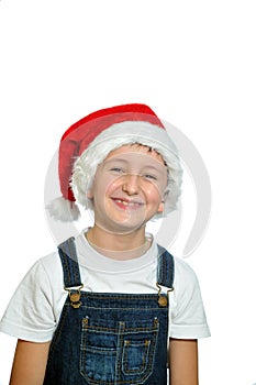 Smiling boy in Santa red hat
