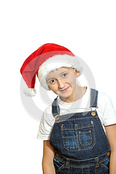 Smiling boy in Santa red hat