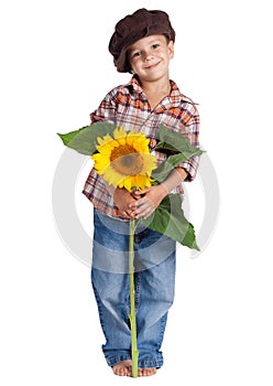 Smiling boy with sunflower