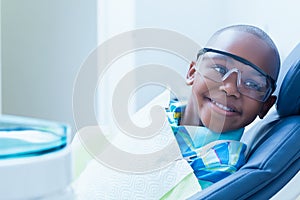 Smiling boy waiting for dental exam