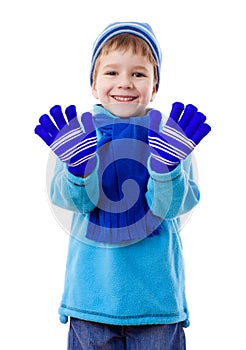 Smiling boy in winter clothes