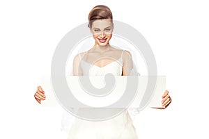 Smiling bride with advertising.