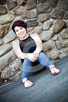 Smiling Brunette Woman Sitting