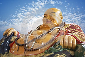 Smiling Buddha, god of happiness, wealth and lucky