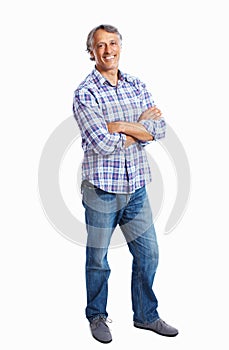 Smiling business man with hands folded. Full length of confident business man smiling with hands folded.