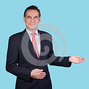 Smiling Business Man Indicating Copy Space