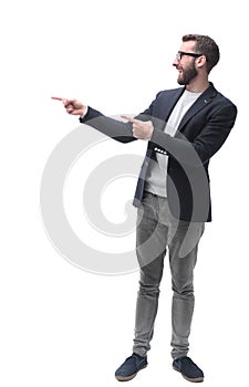 Smiling business man pointing to the side at copy space