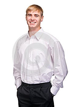 Smiling business man standing with his hands in th