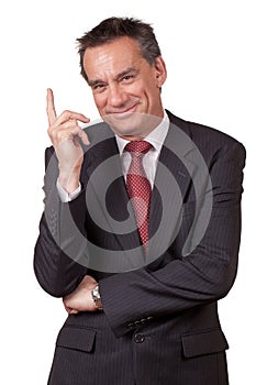 Smiling Business Man in Suit Pointing Up